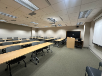 An L-shaped desk with chairs in the Marywood healthy families classroom